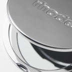 Compact mirror rhode